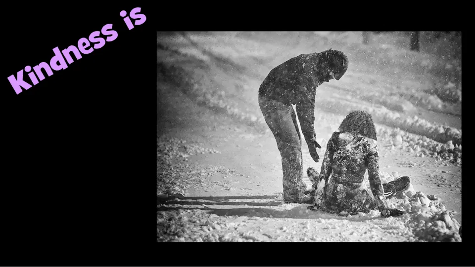 Kindness example slide shows a person reaching toward someone seated in the snow under “Kindness is.”