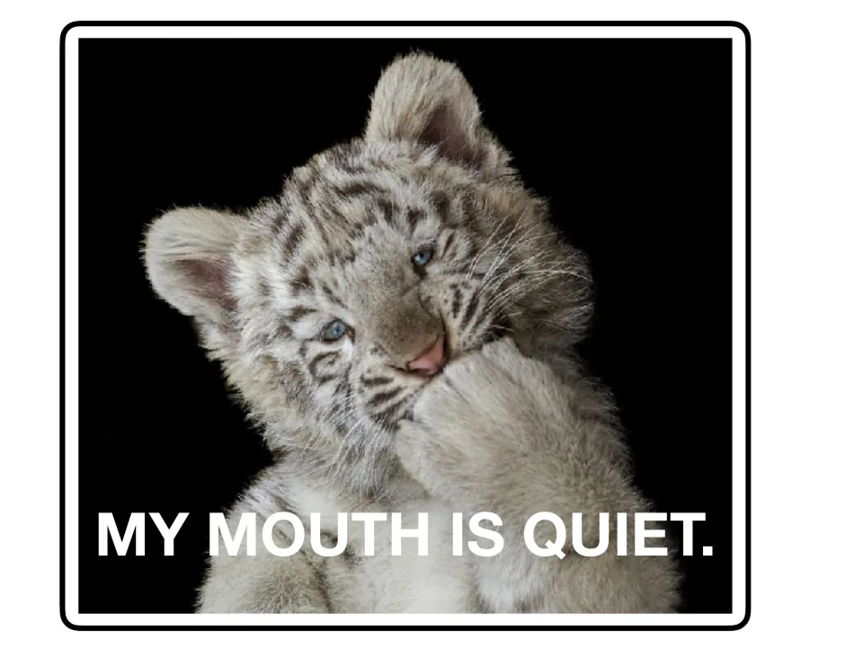 Listening poster 3 of 9: a white tiger cub holds a paw near its mouth beside 'My mouth is quiet.'
