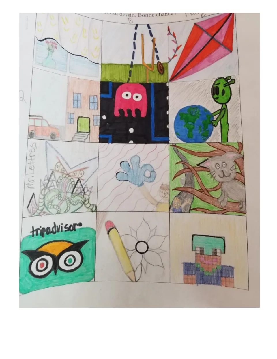 Student example 2: marks turned into a kite, a Pac-Man ghost, an alien holding Earth and a cat in a tree