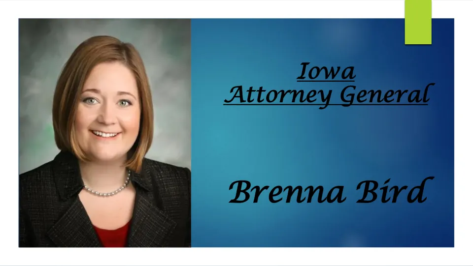 Title slide of a biography presentation on Iowa Attorney General Brenna Bird, shown beside her portrait photo