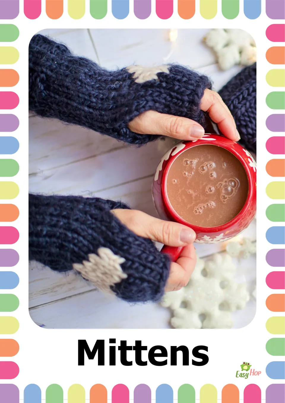 Autumn clothing vocabulary flashcard 9: the label 'Mittens' beneath hands wearing fingerless knit hand warmers