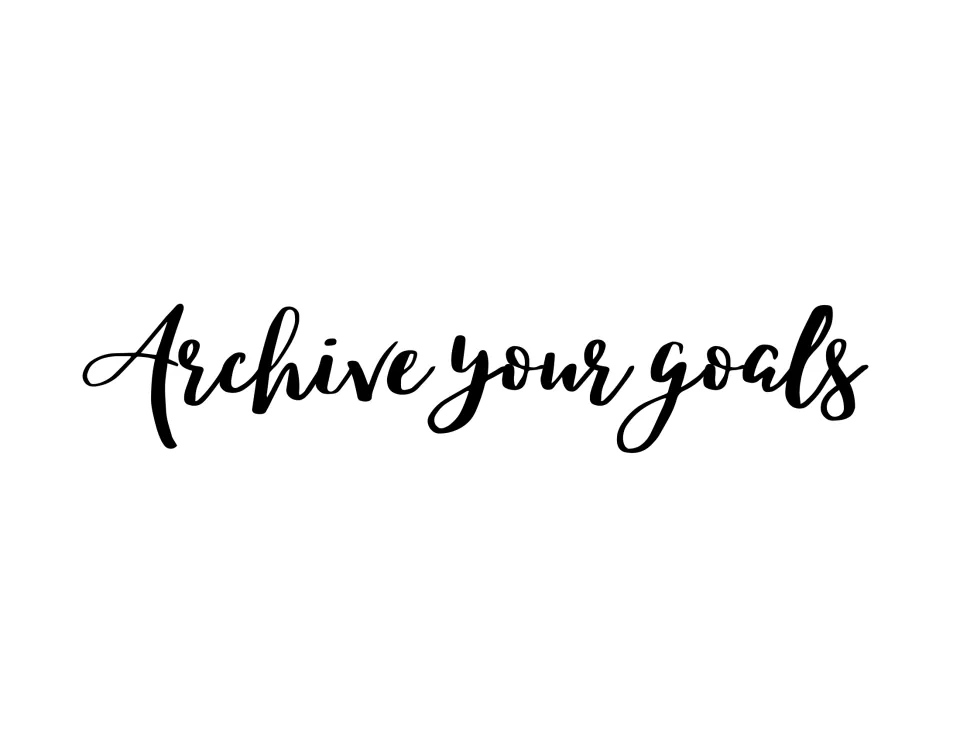 Goal-setting sign reading "Archive your goals" (spelled as printed) in black brush calligraphy