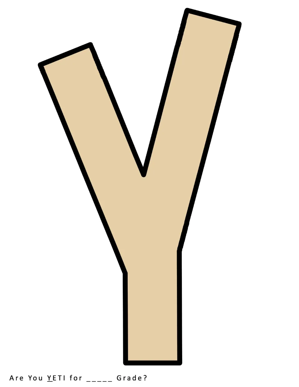 Cut-out piece: a tall tan capital Y, the first letter of the word YETI in the back-to-school bulletin board heading