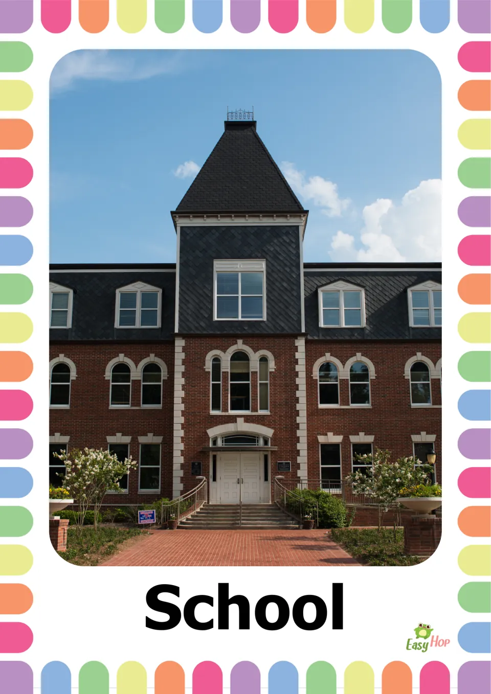 Vocabulary flashcard labeled 'School' showing a brick school building with steps leading to its entrance