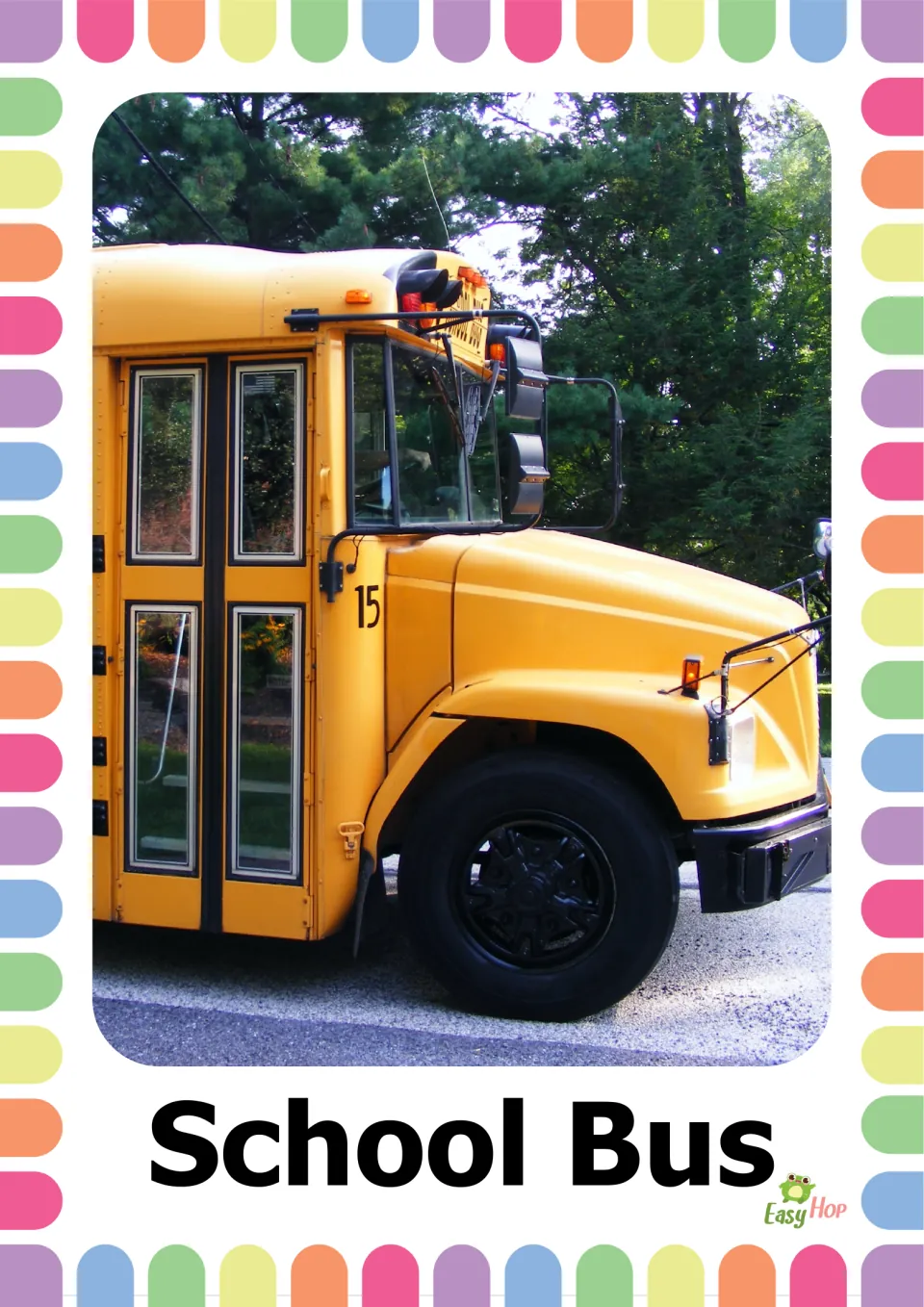 Vocabulary flashcard labeled 'School Bus' showing a yellow school bus with its entry doors and front wheel