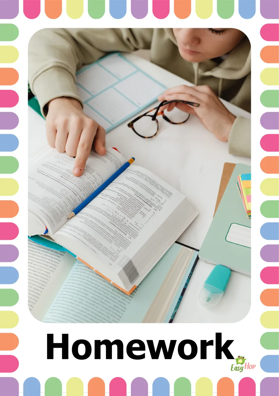 Vocabulary flashcard labeled 'Homework' showing a student pointing to text in an open book while studying