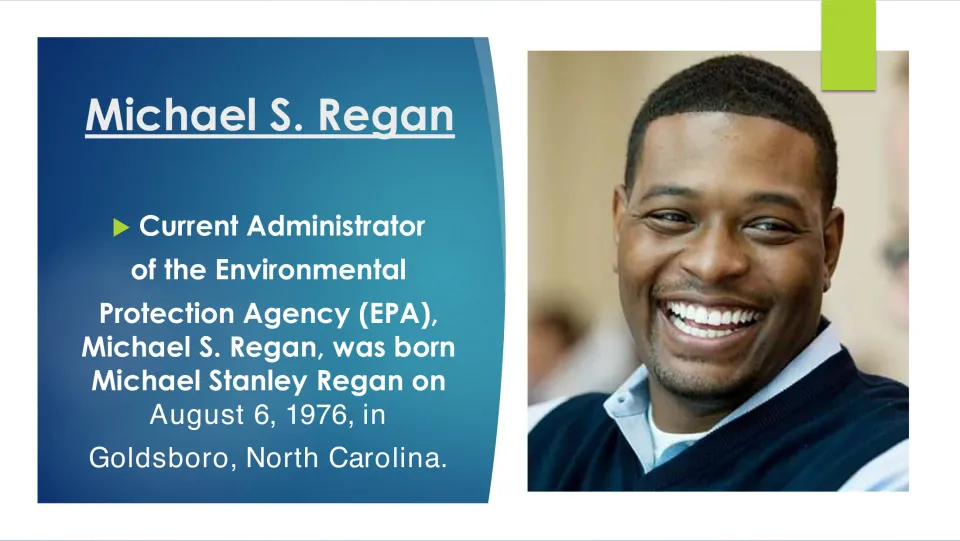 Biography slide giving Michael Stanley Regan’s birth date as August 6, 1976, in Goldsboro, North Carolina