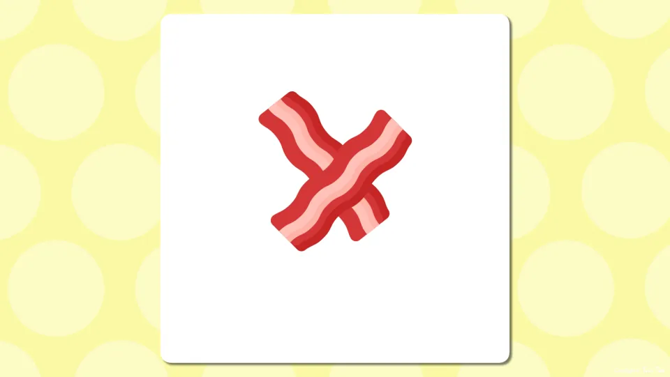 Breakfast word slide showing two crossed strips of bacon with no label, so students name the food before the word appears