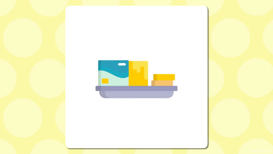 Unlabeled breakfast picture slide showing a blue package and yellow blocks on a gray dish for students to name the food