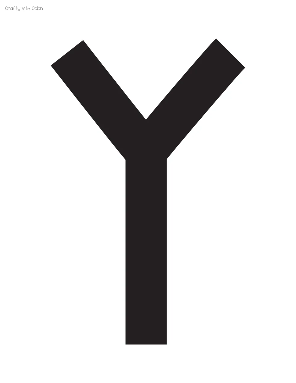 Display letter Y, fifth in the set: a full-page solid black capital Y with two angled arms meeting a straight stem