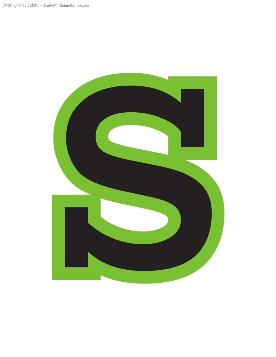 Bulletin board letter S in black with a lime green outline, one of the two S letters that end the word CLASS