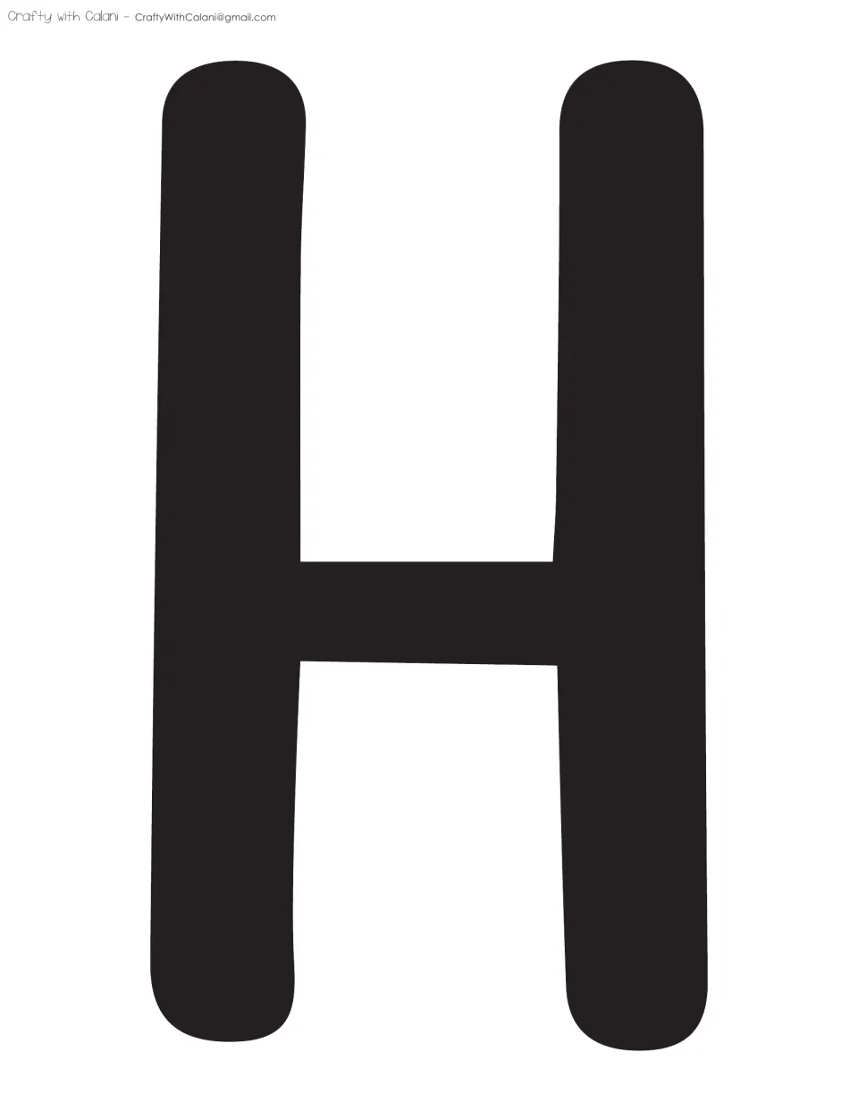 Bulletin board lettering: a large black capital H letter template with two tall rounded posts, second letter of THIS