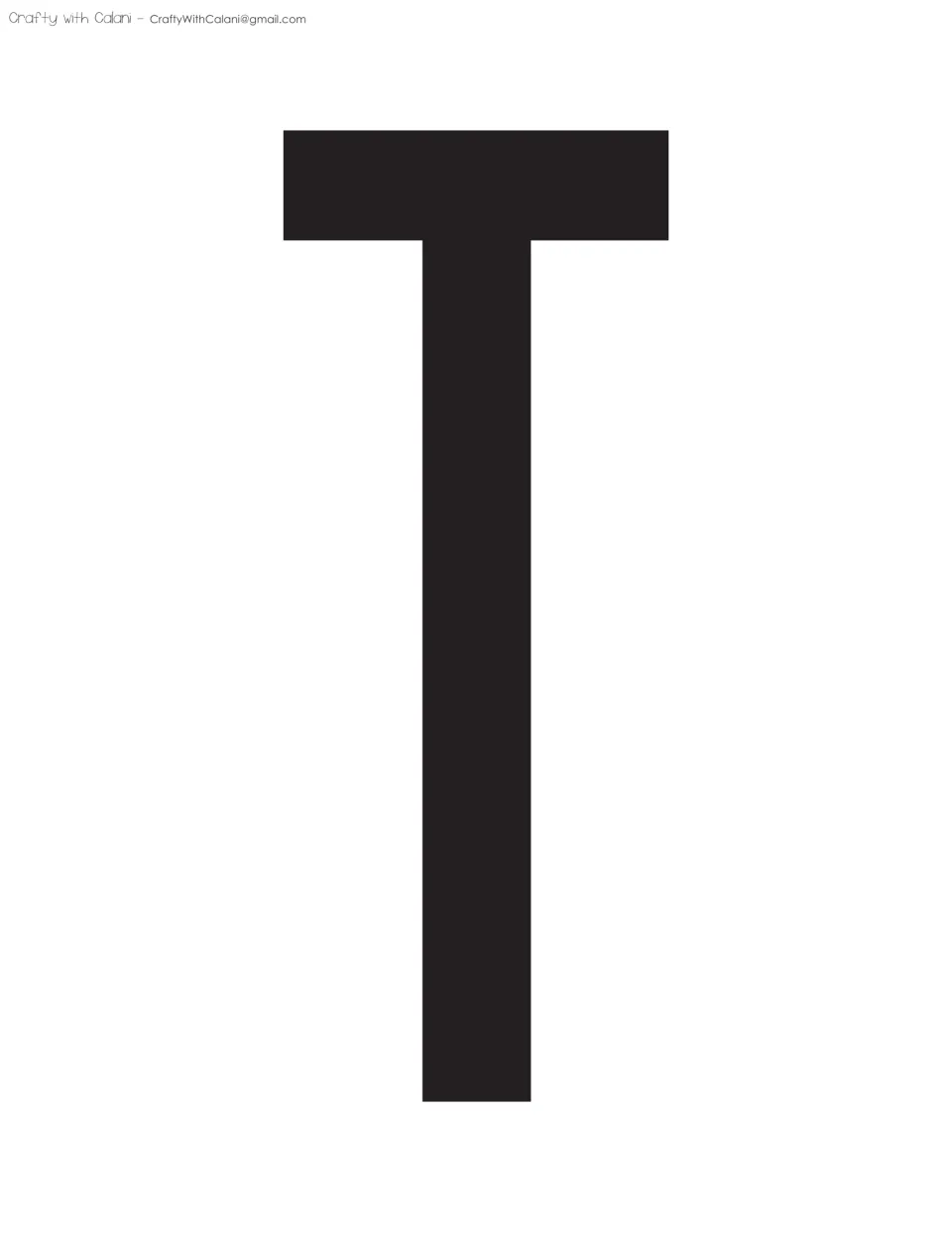 Bulletin board cut-out letter T, printed in black as one of the large letters for the classroom display.