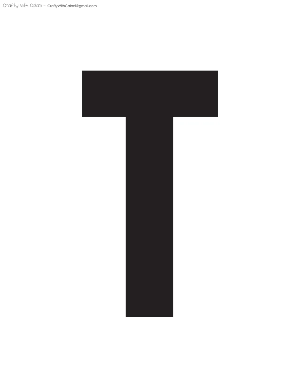 Banner letter T, fifth letter of CREATE: a tall solid black capital T template for the door or board display