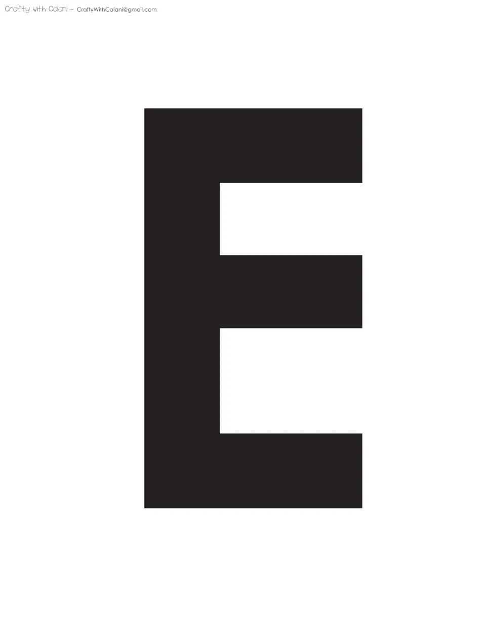 Banner letter E, final letter of CREATE: a solid black capital E that ends the LET'S CREATE display phrase