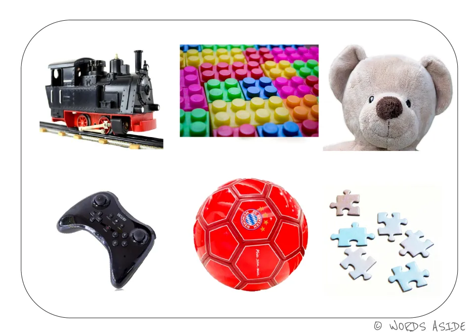 Toys vocabulary board featuring a train, building blocks, teddy bear, game controller, soccer ball, and puzzle pieces
