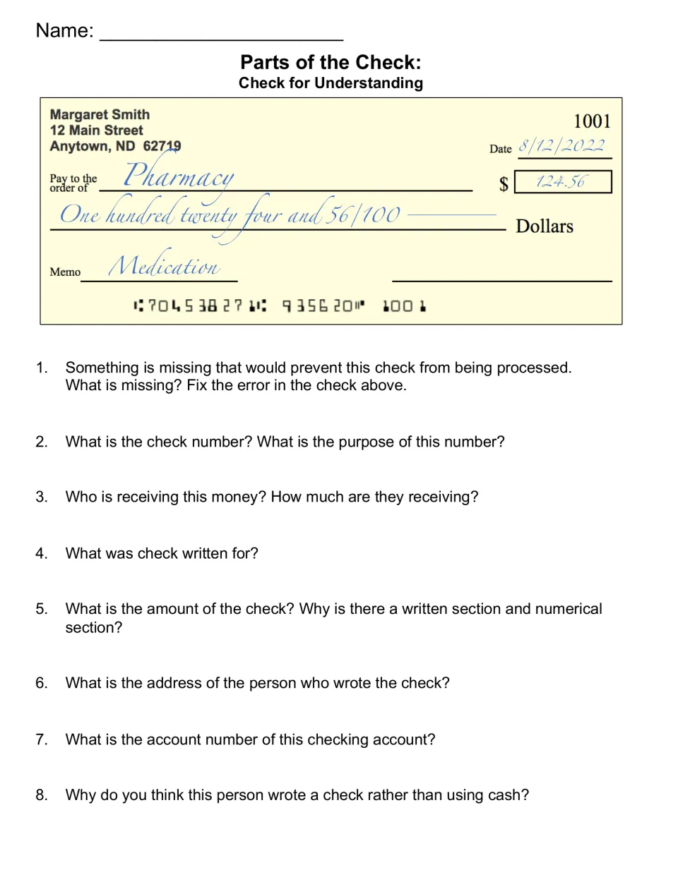 Check for understanding: students spot what is missing on a $124.56 pharmacy check and answer 8 questions on its parts