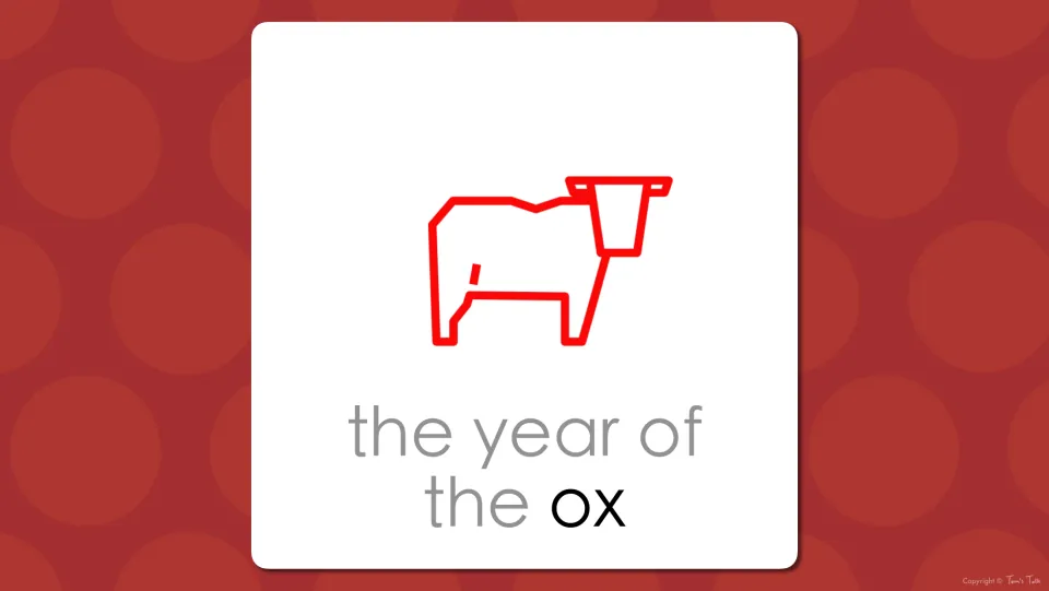 Zodiac vocabulary slide: the red ox drawing labeled 'the year of the ox', pairing the picture with the word ox in bold