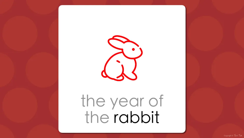 Zodiac vocabulary slide: the red rabbit drawing labeled 'the year of the rabbit', matching the image to the word rabbit