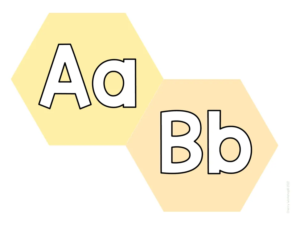 Alphabet display letters Aa and Bb: bold white upper- and lowercase letters on pastel yellow and peach hexagons