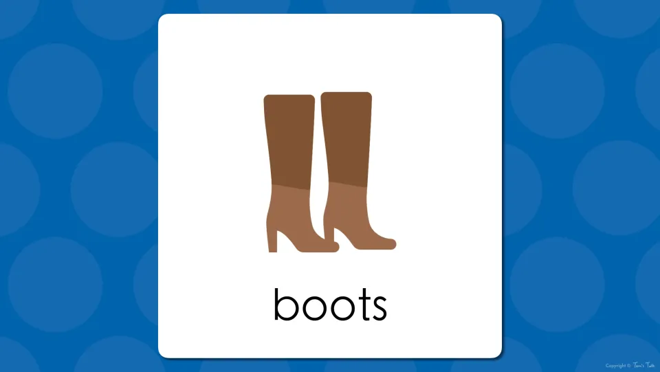 Clothing word reveal: the tall brown boots appear with the word 'boots' so students confirm the name and read it