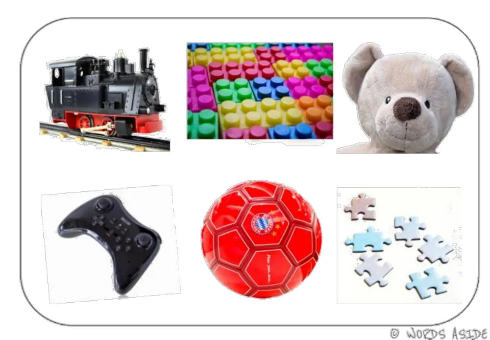Toy vocabulary photo mat showing a train, building blocks, teddy bear, game controller, ball, and puzzle pieces