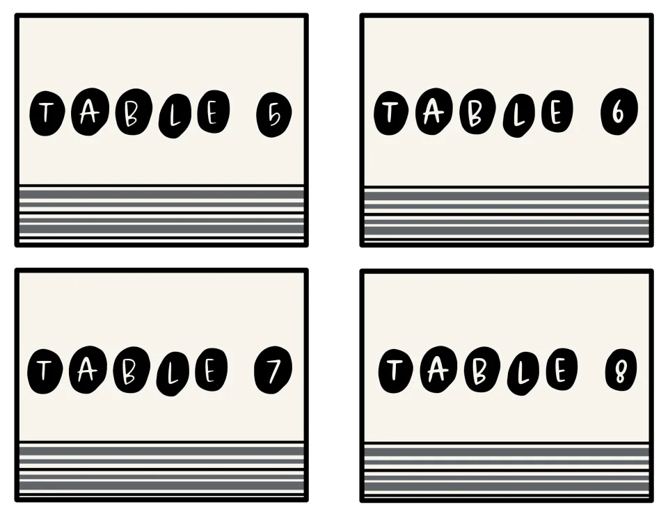 Table number signs 5 to 8: cream cards with TABLE and the number in white letters on black pebbles above gray stripes