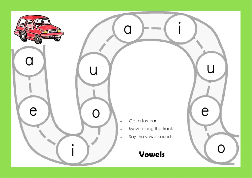 Mixed vowels track in color: students move a toy car along the road and say each short vowel sound for a, e, i, o and u