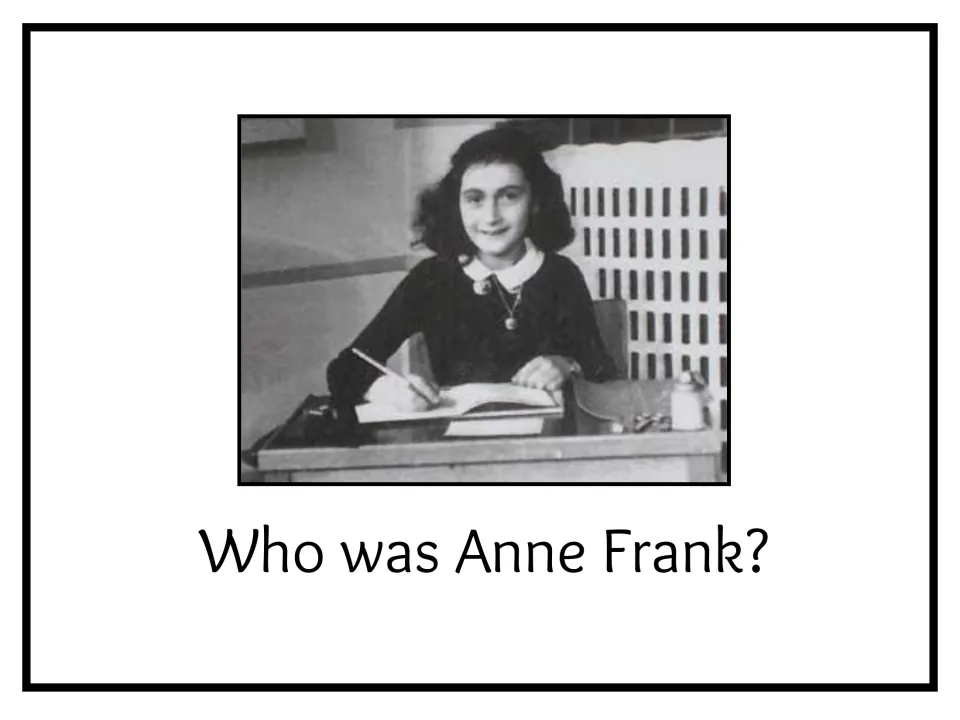 Opening slide titled “Who was Anne Frank?” introduces the biography with a photograph of Anne at a desk.