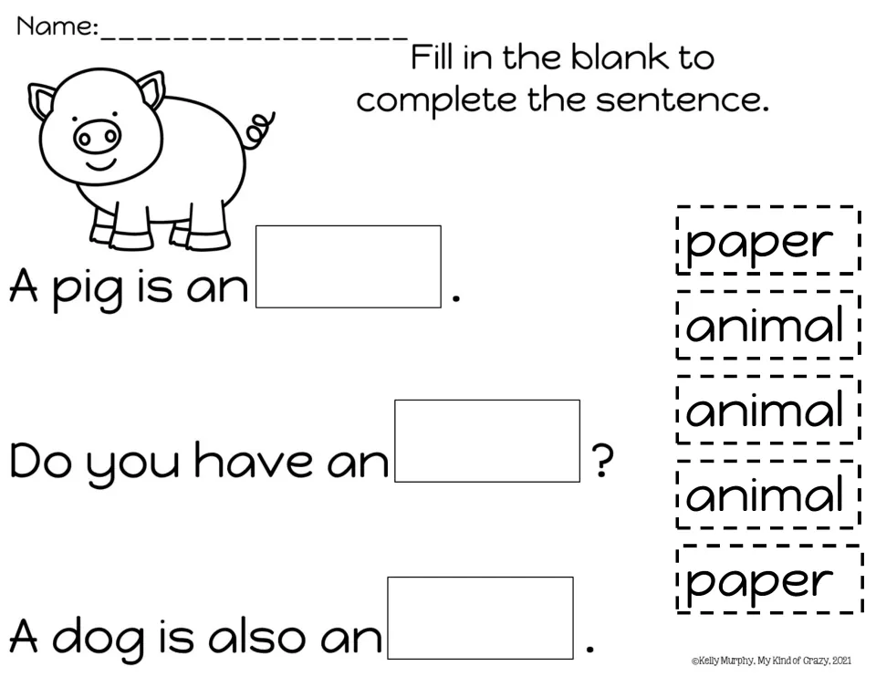 Sentence completion with animal: students glue animal or paper word cards into A pig is an ___ and two more