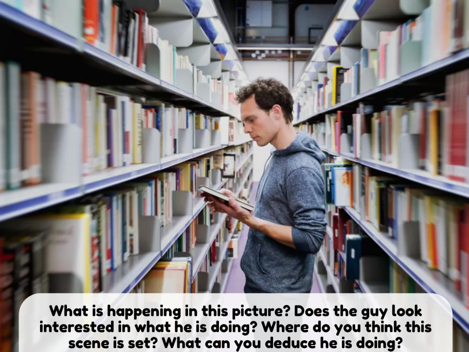 Picture description: a young man reads between library shelves; students say where he is and deduce what he is doing