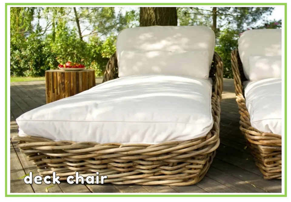 Labeled garden vocabulary flashcard showing a woven chair with white cushions and the words 'deck chair'