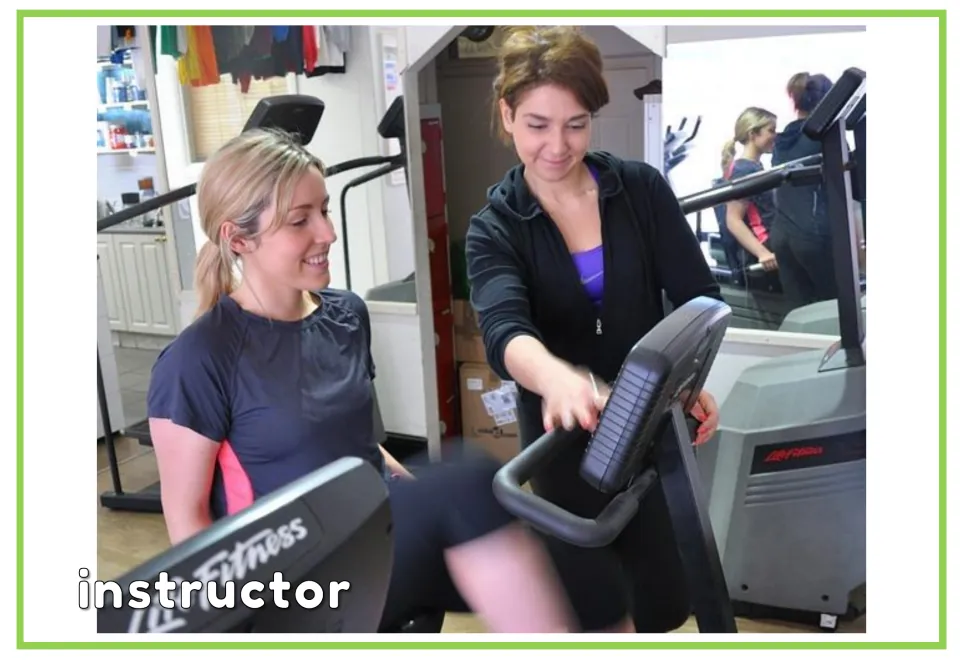 Gym vocabulary flashcard labeled 'instructor' showing an instructor helping someone use an exercise machine