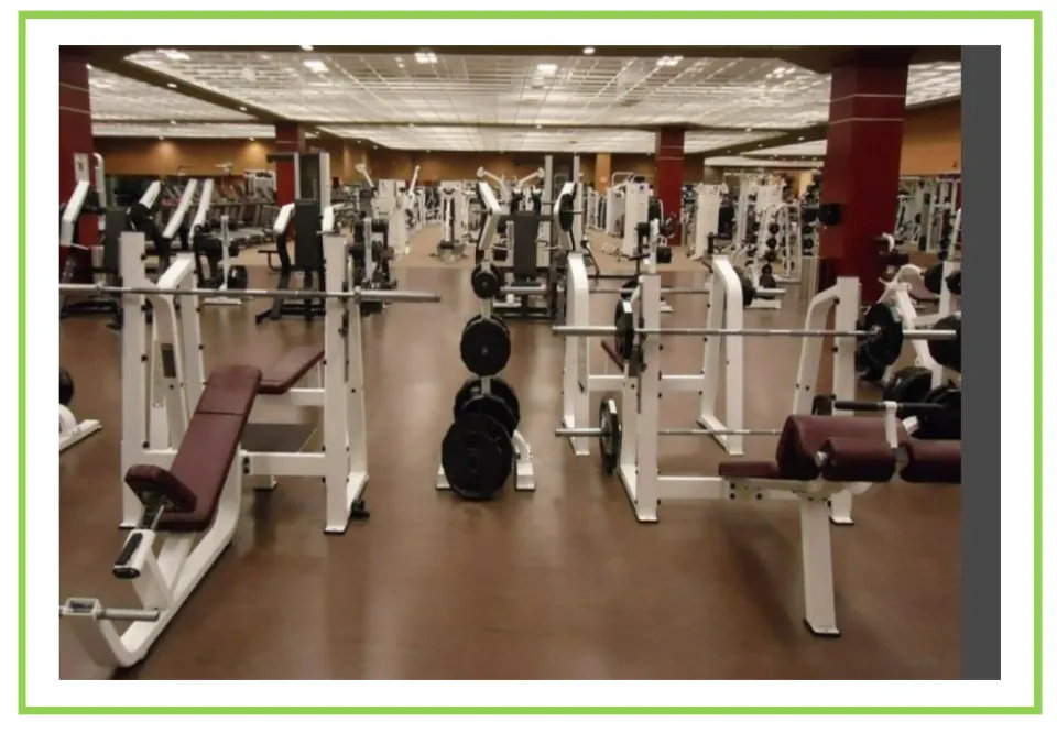 Picture-only gym vocabulary flashcard showing exercise equipment, including weight benches and barbells