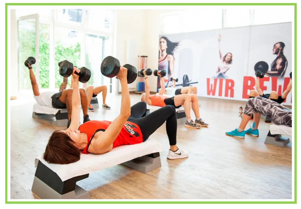 Picture-only hobbies vocabulary flashcard showing people lifting dumbbells, paired with the exercise card
