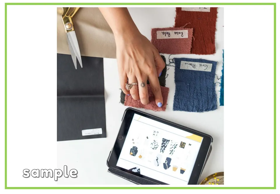 Labeled shopping vocabulary flashcard for 'sample,' showing a hand touching one of several fabric swatches