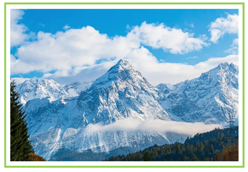 Picture-only weather vocabulary flashcard showing snow-covered mountains, paired with the labeled snow card