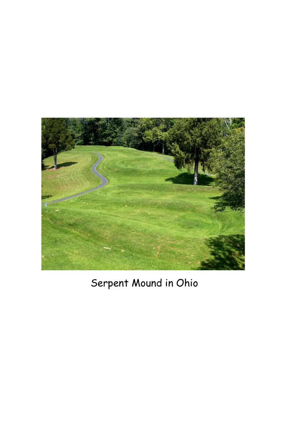 Shawnee history eBook photograph shows the grassy earthwork labeled 'Serpent Mound in Ohio' beside a path