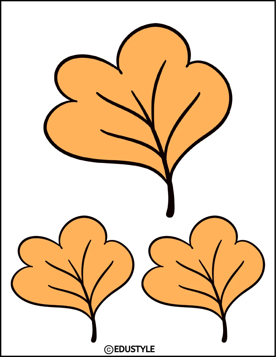 Three mirrored golden-orange leaf cutouts, one large and two small, for the fall bulletin board decor
