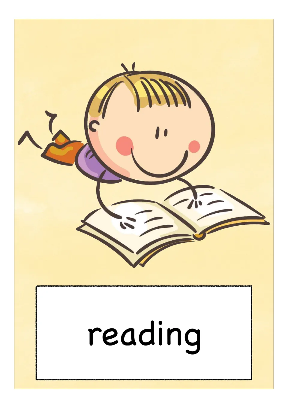 Vocabulary card for reading: a smiling boy lies on his stomach reading an open book, with the word labelled below