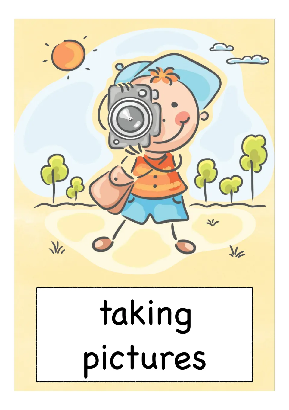 Vocabulary card for taking pictures: a boy in a blue cap aims a camera at the viewer in a park with trees