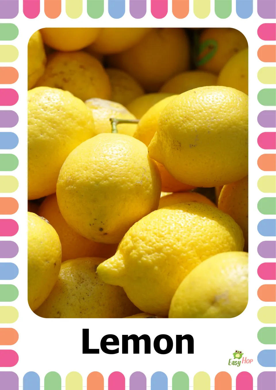 Lemon flashcard: a close-up pile of bright yellow lemons, labeled Lemon, for students to identify and name the fruit