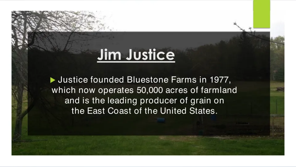 Biography slide on Jim Justice founding Bluestone Farms in 1977, describing 50,000 acres and grain production