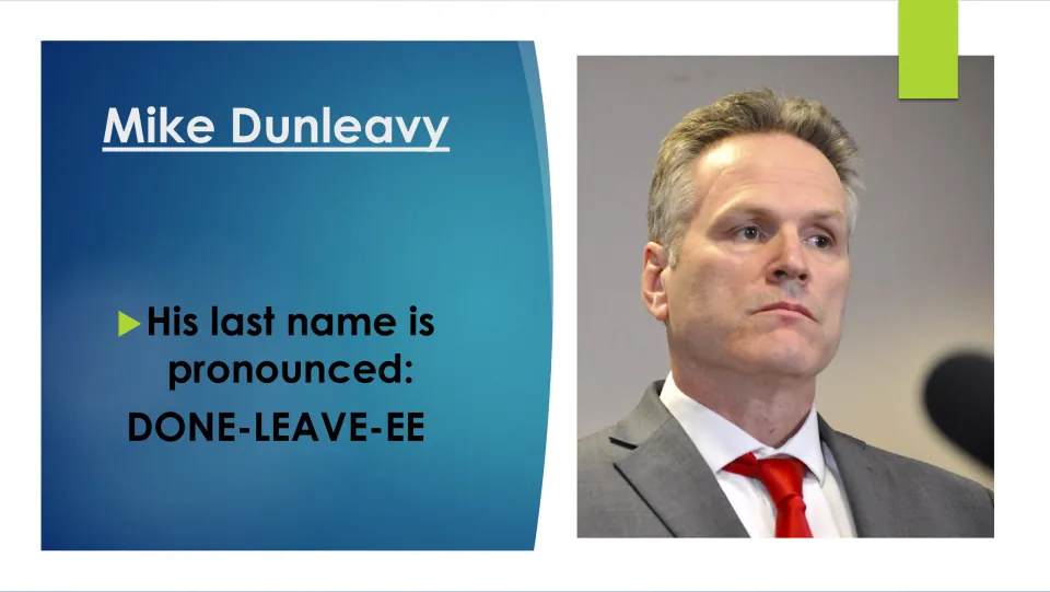 Biography slide 3 explains how to pronounce Mike Dunleavy's last name as DONE-LEAVE-EE beside his portrait