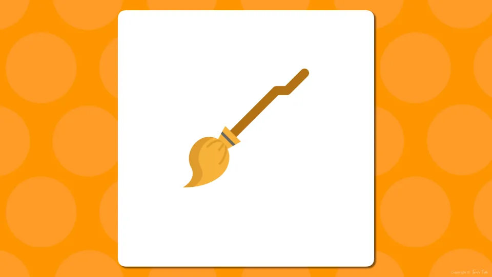 Halloween picture slide: a broom with a yellow straw brush and no word shown, for students to name the object first