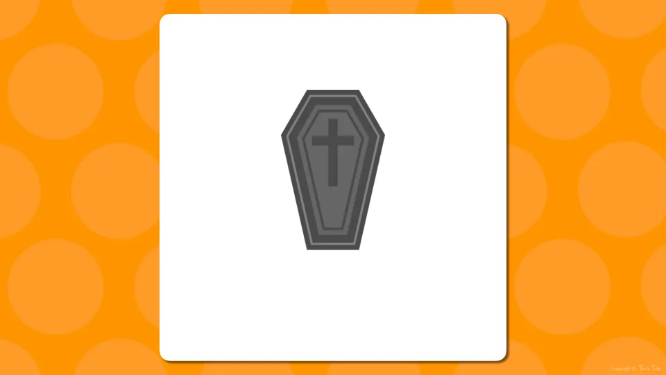 Halloween picture slide: a gray coffin marked with a cross and no word shown, for students to name before the reveal