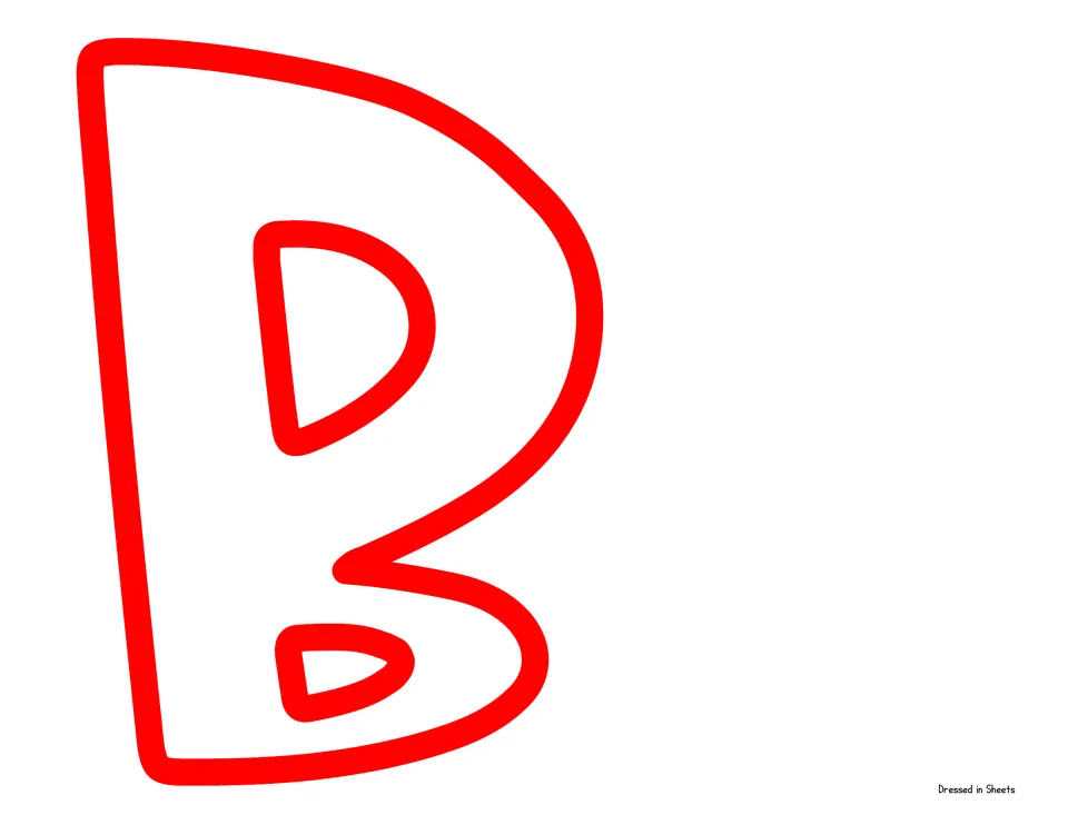 Letter B cut-out: large white B outlined in red that starts the word BOOKS on the lower row of the display