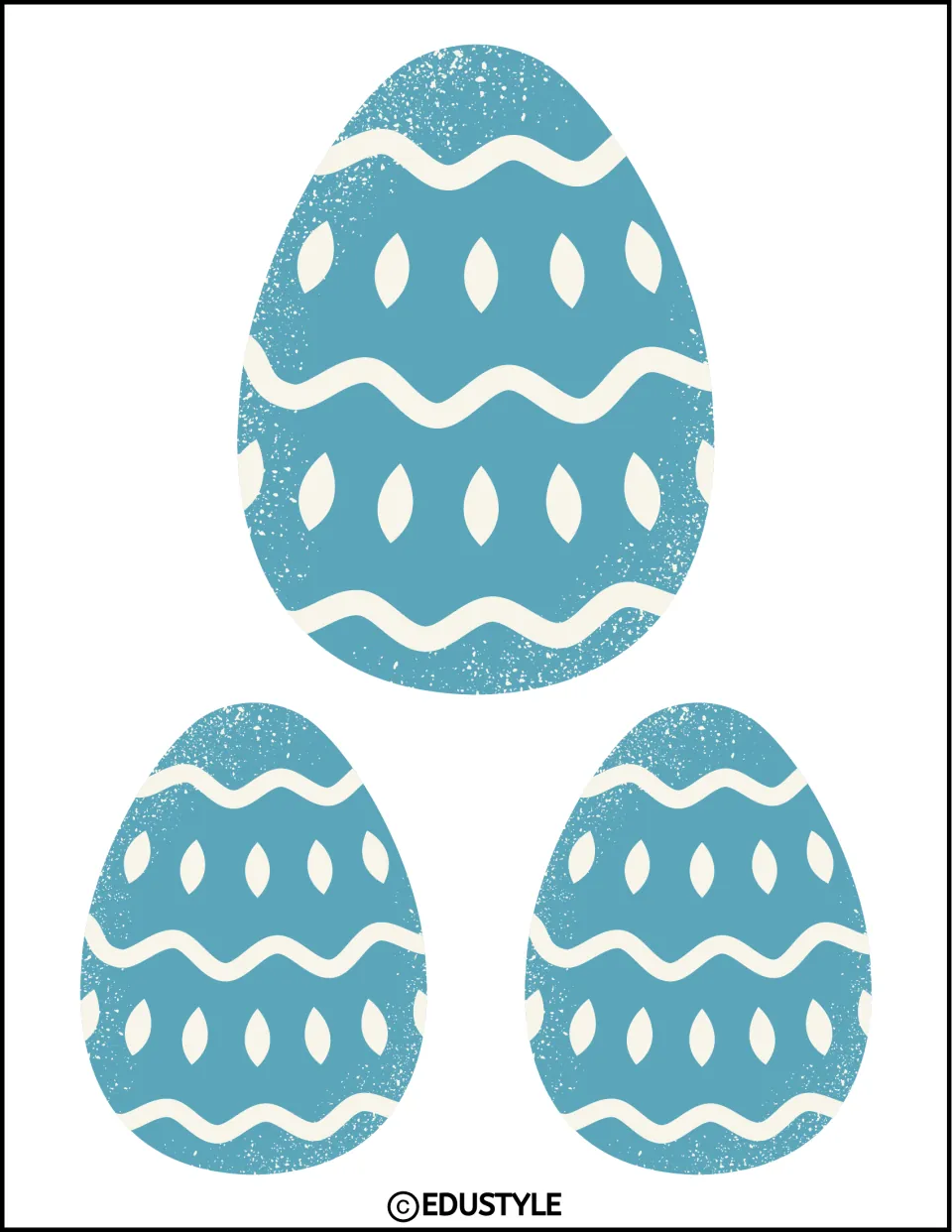 Three Easter egg decor pieces, one large and two small, in blue with cream waves and leaf-shaped marks