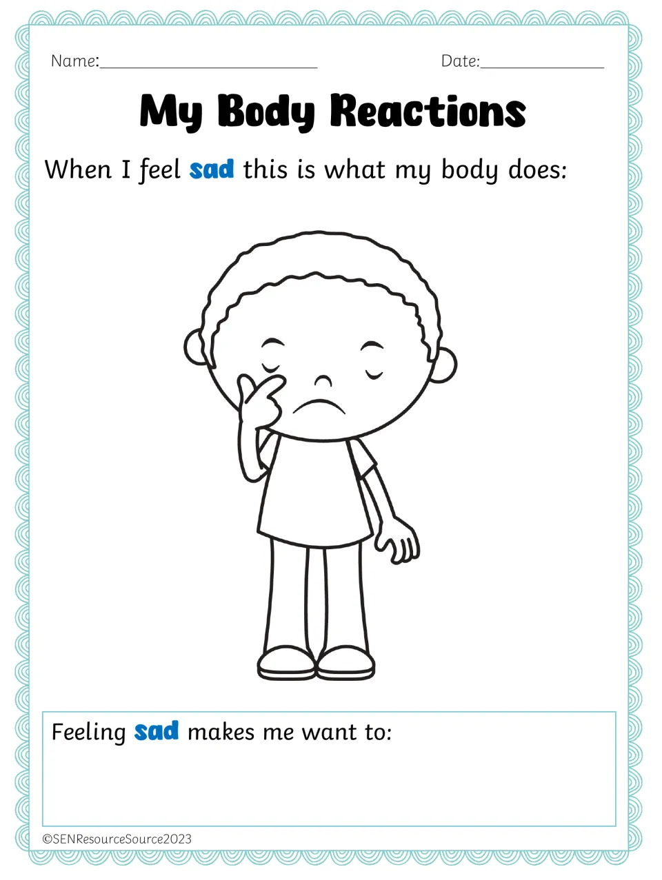 Sadness body cues: a boy wipes his eye as students record how sadness feels physically and what it makes them want to do
