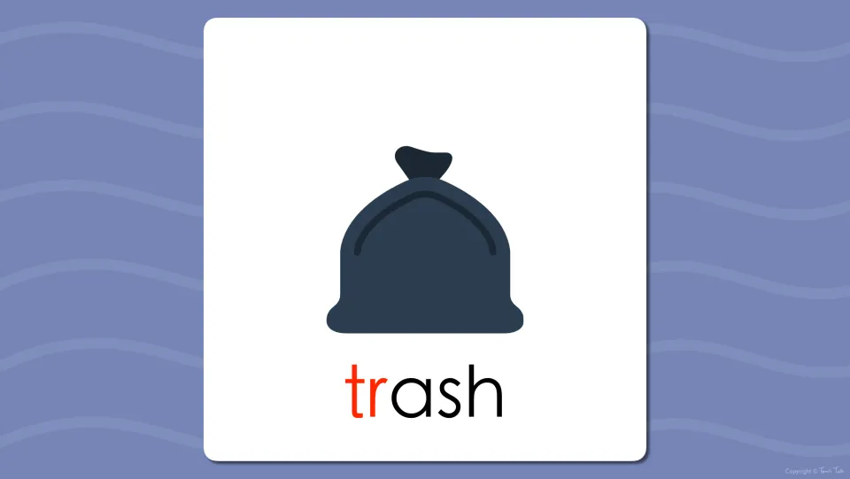Word reveal flash card: the tied garbage bag picture labeled trash, with the tr blend at the start of the word in red
